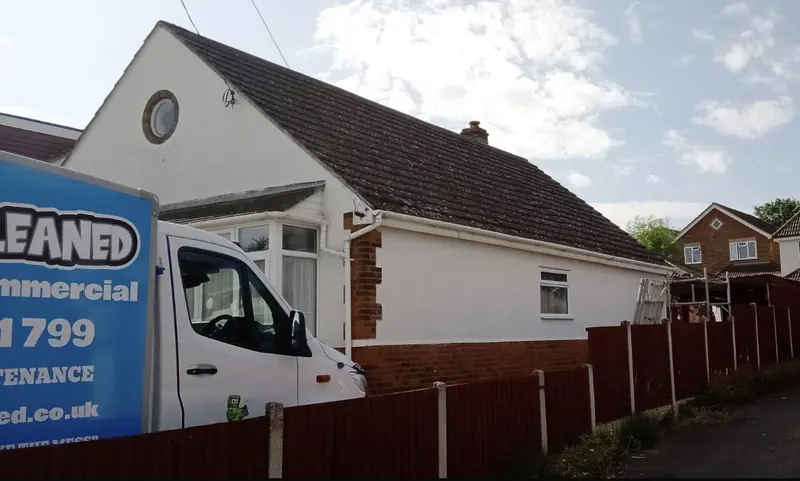 JustBinCleaned van parked outside a white bungalow