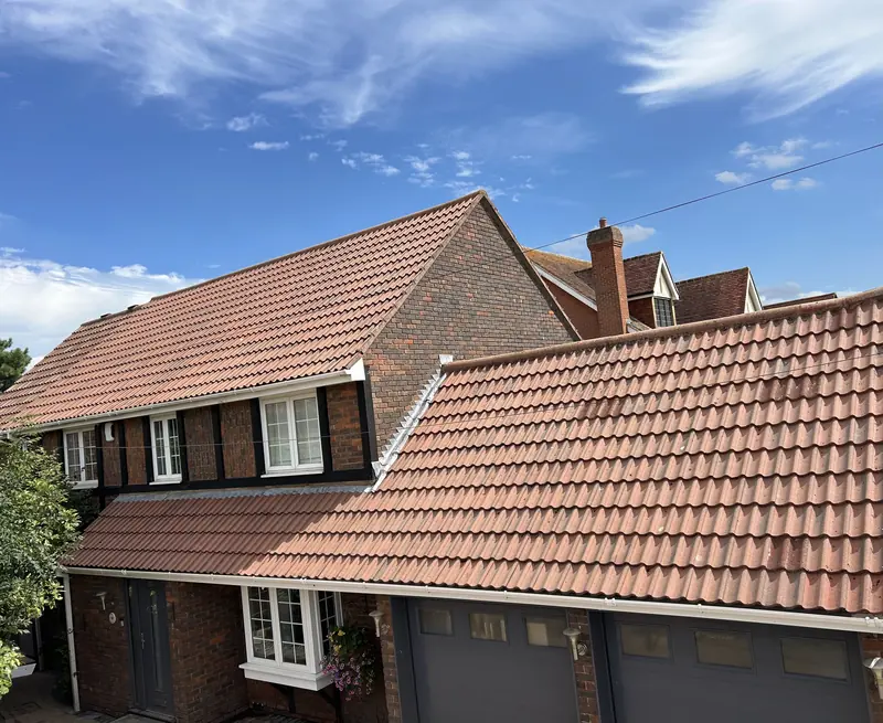 Detached house with a red tiled roof