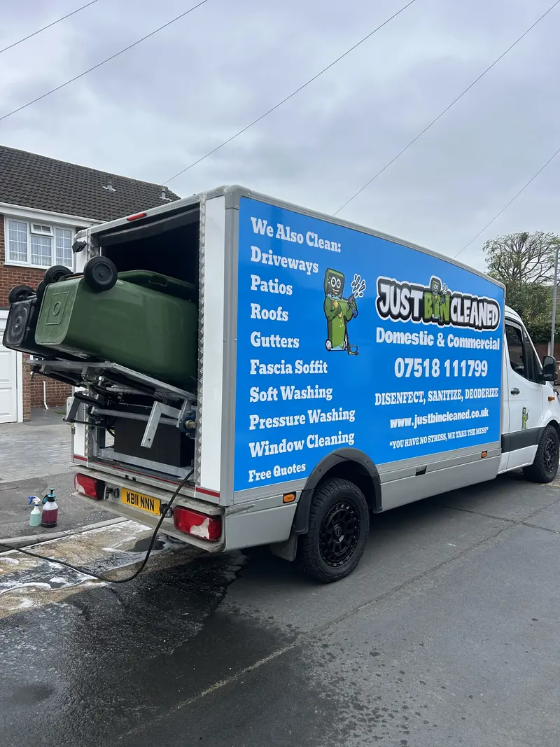 JustBinCleaned van with a green wheelie bin on the washing lift